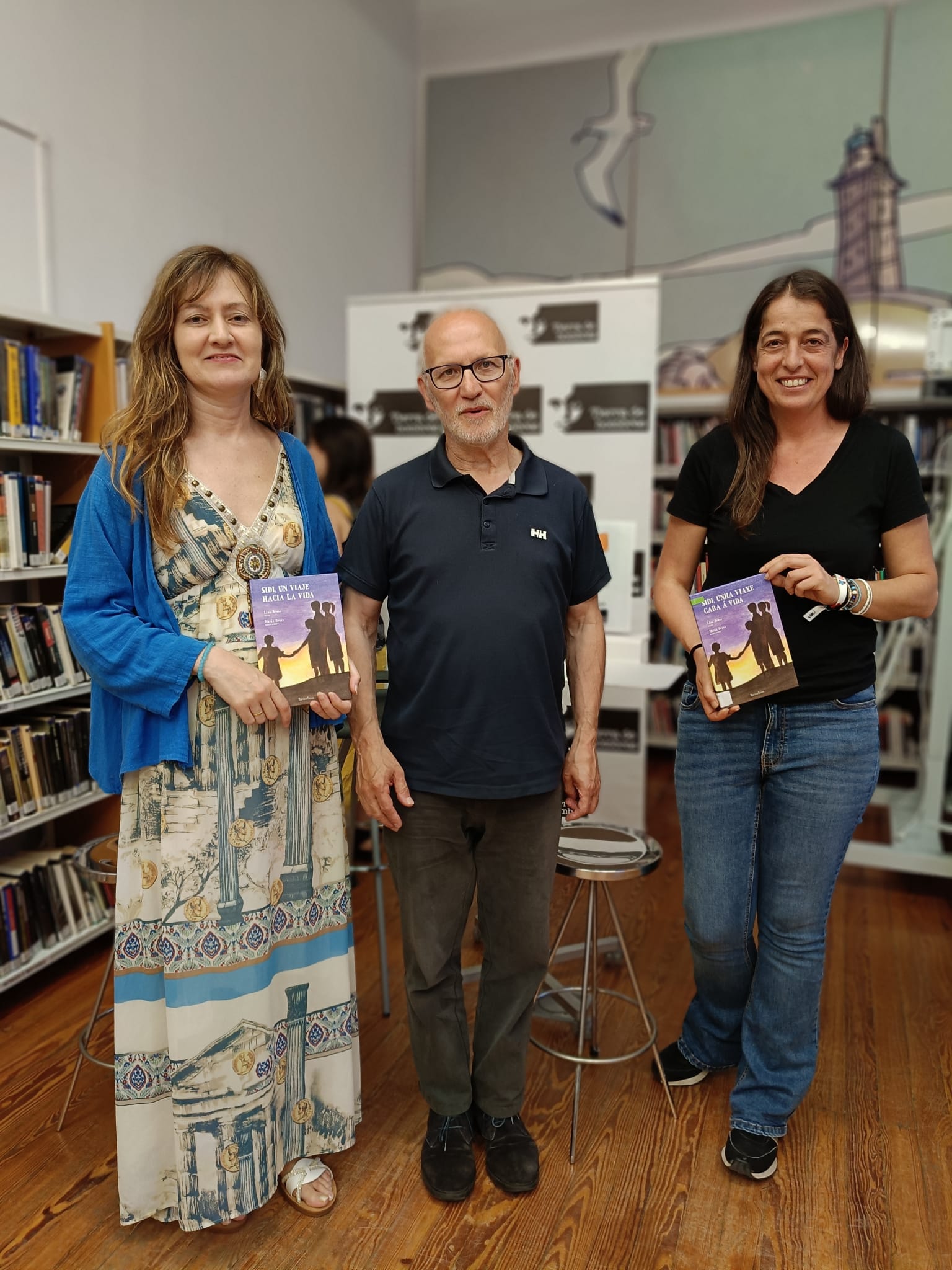 Raúl Besada junto a María Braxe (izquierda) y María Filgueira
